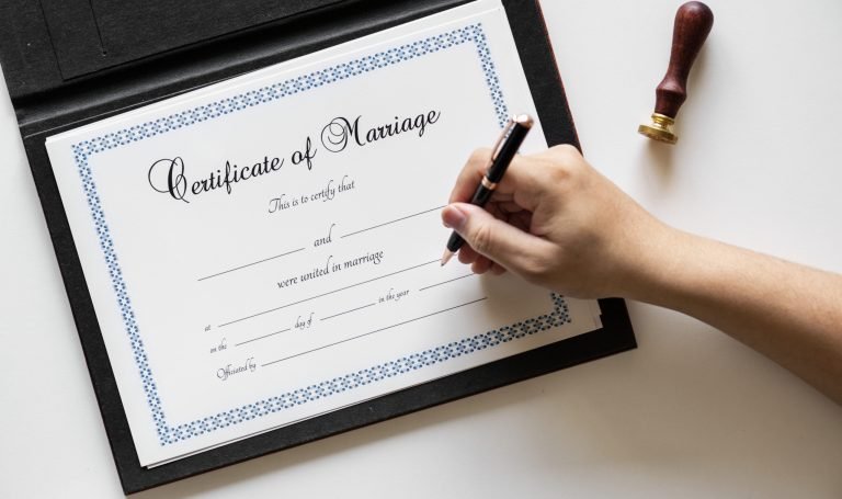 Hand signing on marriage certification